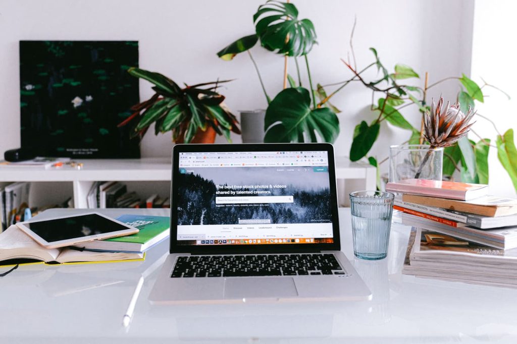 A student work on laptop to follow freelancing growth roadmap